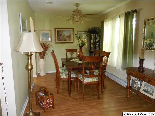 12 Phillips Road Brick, NJ 08724 - Photo 7 of 19 a view of a dining room with furniture