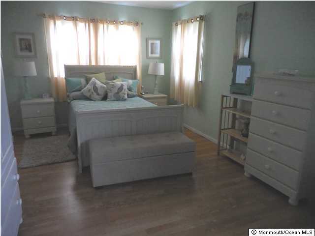 12 Phillips Road Brick, NJ 08724 - Photo 9 of 19 a living room with furniture and a window