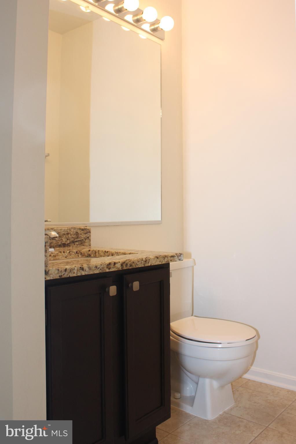 7305 Rokeby Drive Manassas, VA 20109 - Photo 17 of 30 Half Bath on Kitchen Level