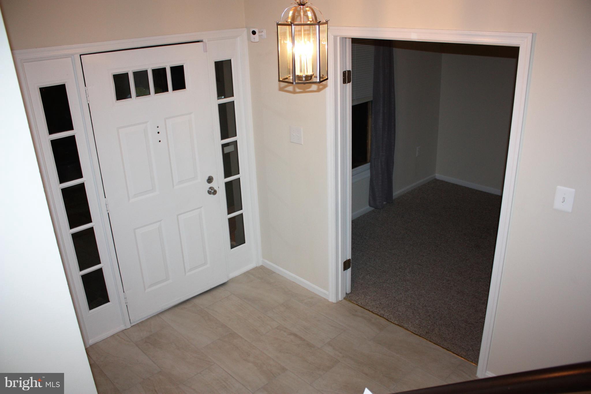 7305 Rokeby Drive Manassas, VA 20109 - Photo 4 of 30 Foyer Connects to Bedroom 4/Den