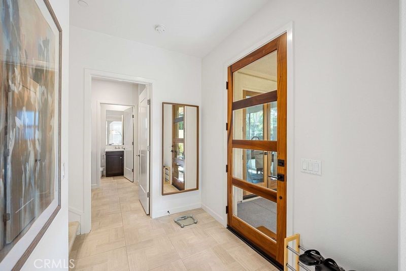 100 Barrington Irvine, CA 92618 - Photo 9 of 30 a view of an entryway with wooden floor and door