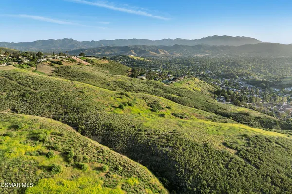 a view of a mountain with an outdoor space