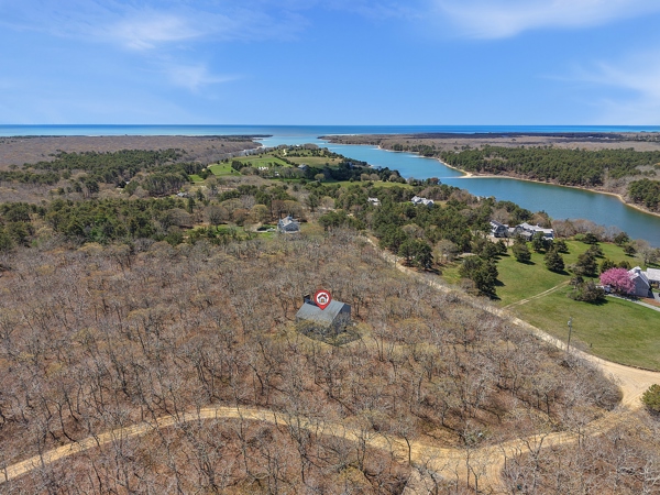 82 Oyster Pond Road Edgartown, MA 02539 - Photo 12 of 53 an aerial view of a city and mountain view in back