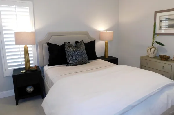 a bedroom with a bed