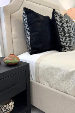 a bathroom with a granite countertop sink mirror toilet and shower