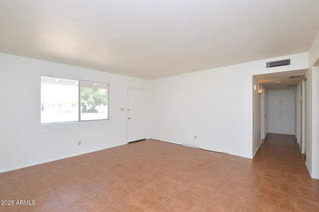 an empty room with a window