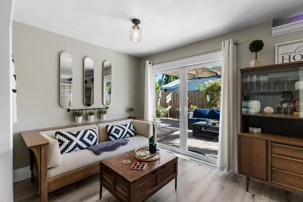 a bedroom with a bed and a table