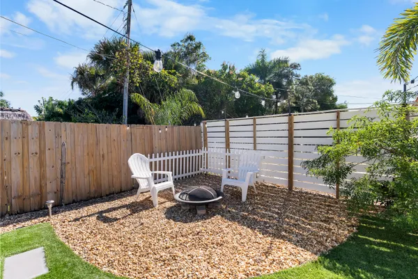 a view of a backyard with a garden