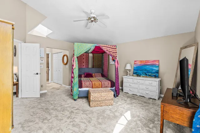 a bathroom with a bathtub a sink and a mirror