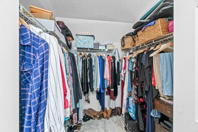 a bathroom with a bathtub and toilet