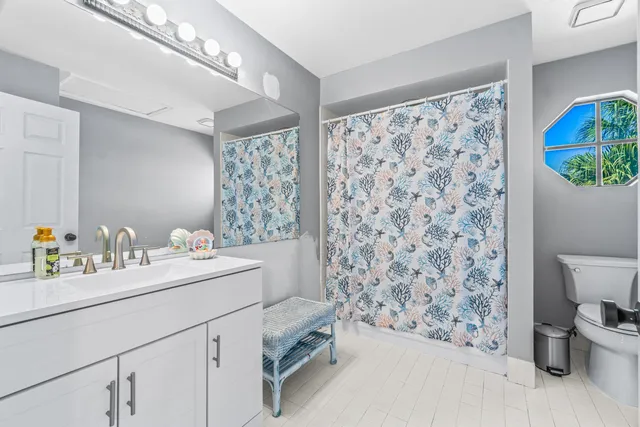 a view of a room with furniture and toys