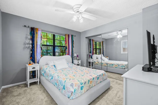 a view of an entryway with furniture and rug