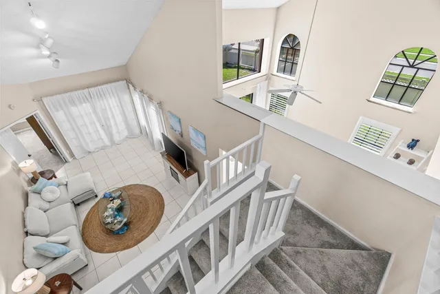 a front view of a house with a yard table and chairs