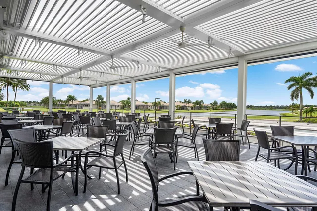 a view of a golf course with a lake