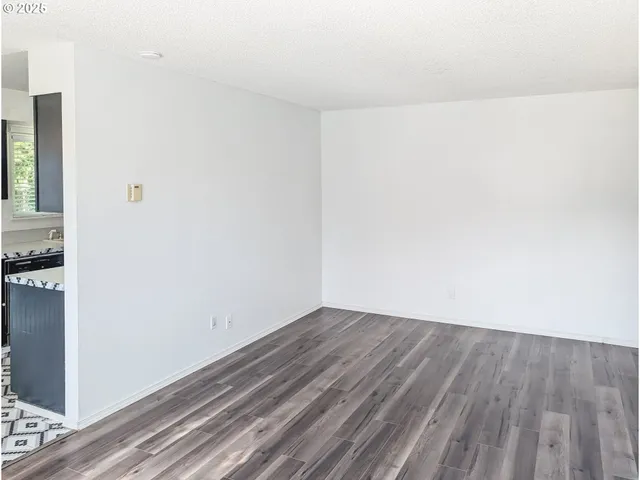 a view of small space with wooden floor