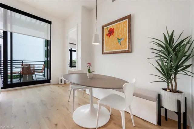 a view of a livingroom with furniture and window