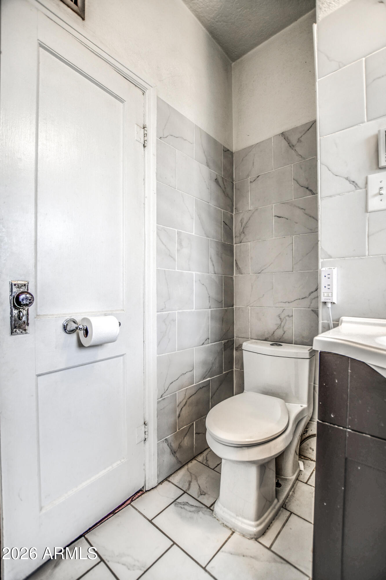 384 East Windsor Avenue Phoenix, AZ 85004 - Photo 12 of 42 a bathroom with a toilet and a shower