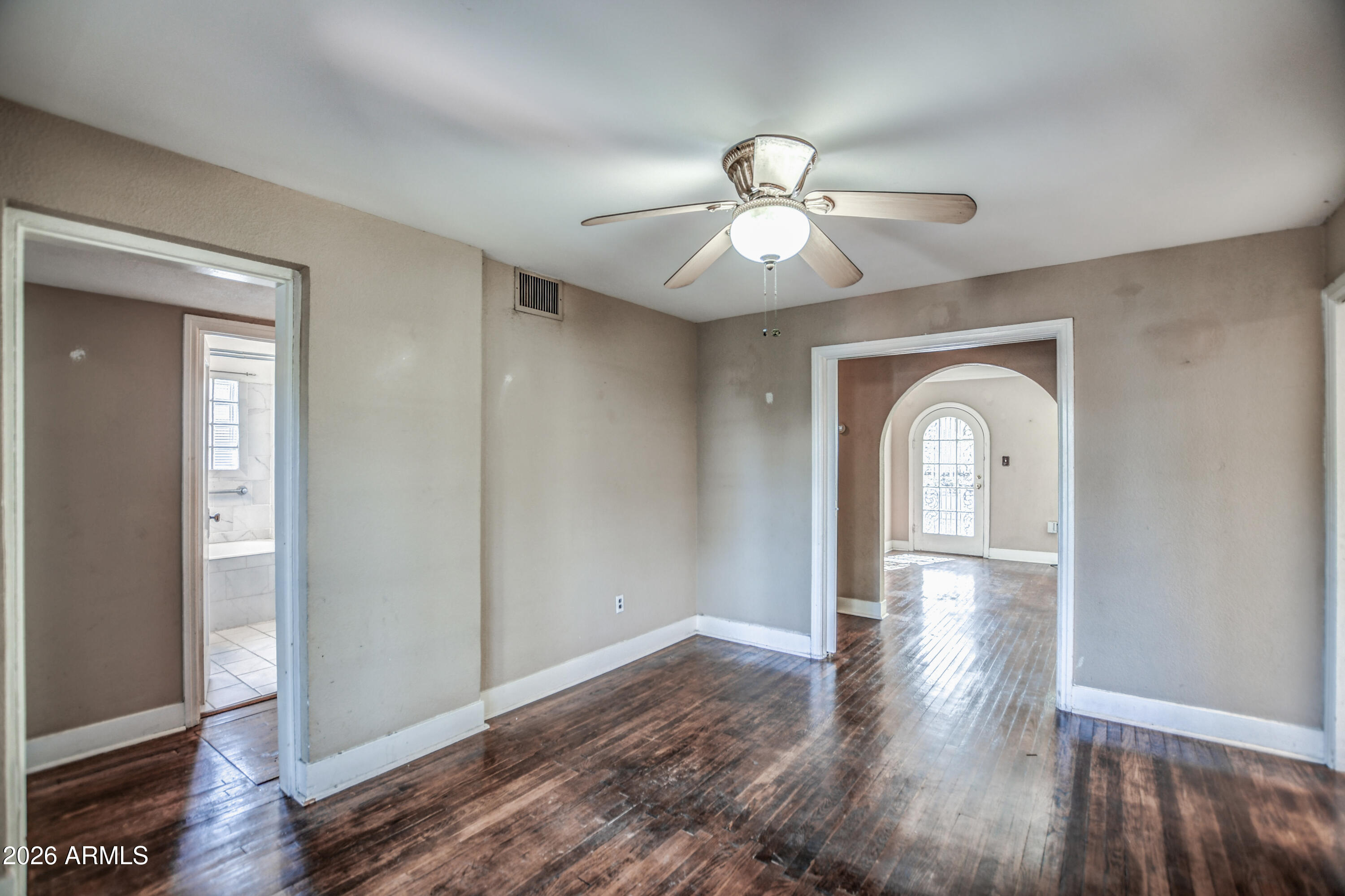 384 East Windsor Avenue Phoenix, AZ 85004 - Photo 21 of 42 a view of empty room with wooden floor