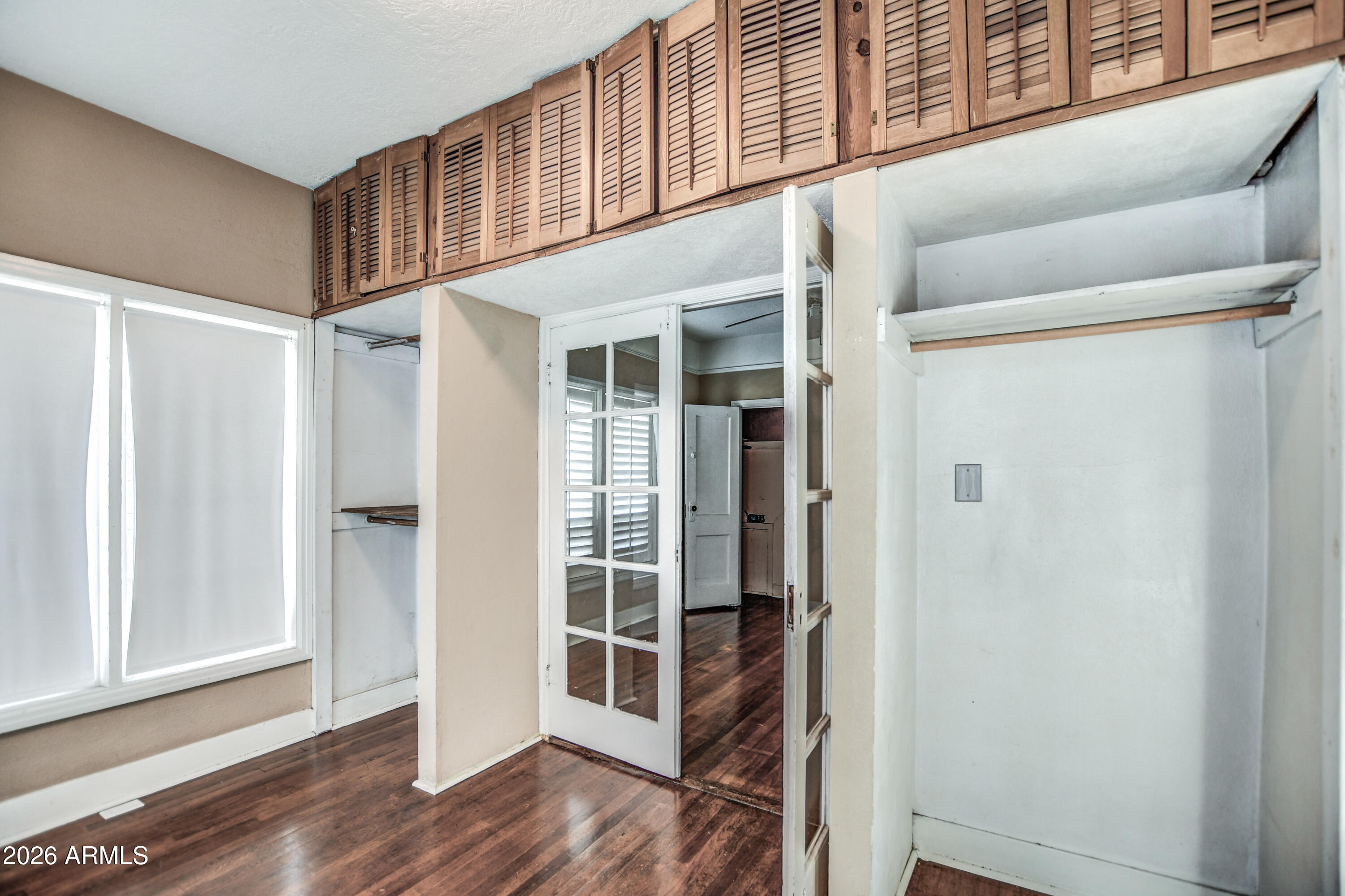 384 East Windsor Avenue Phoenix, AZ 85004 - Photo 34 of 42 a view of a hallway with wooden floor and entryway