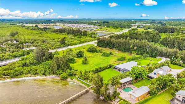 a view of an ocean and a yard
