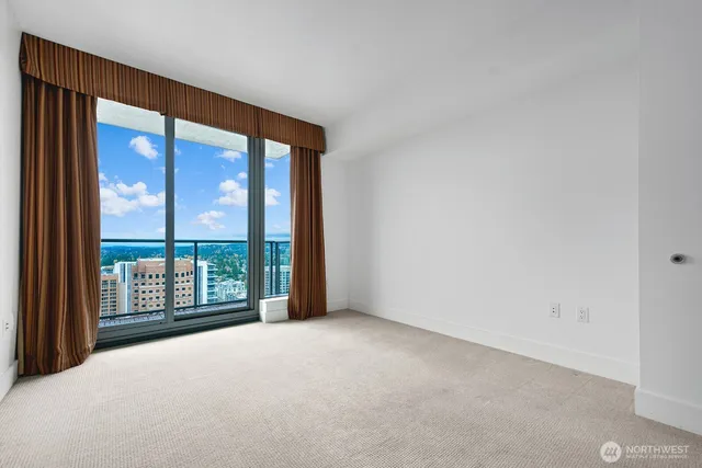 a view of a swimming pool outdoor seating