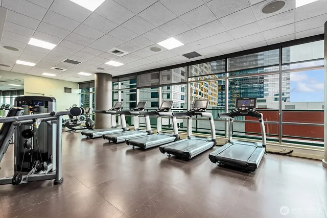 a view of parking garage with cars