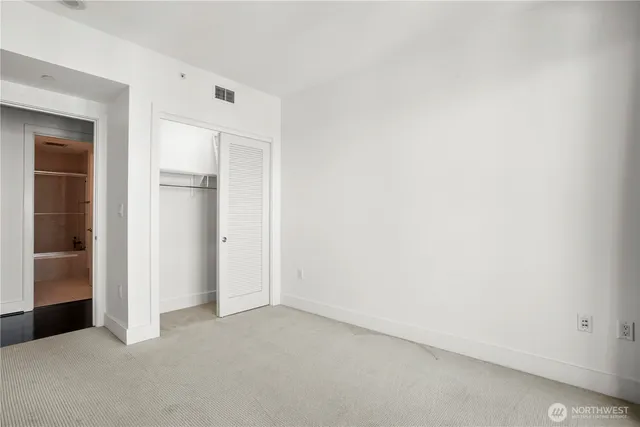 an empty room with closet