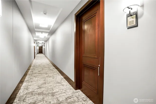 wooden floor with a white walls