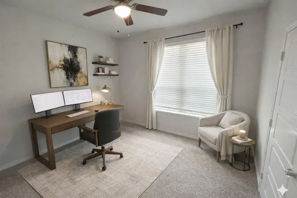 a workspace with furniture and a window