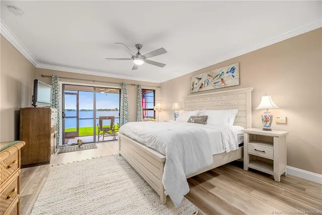 a spacious bedroom with a bed and a couch