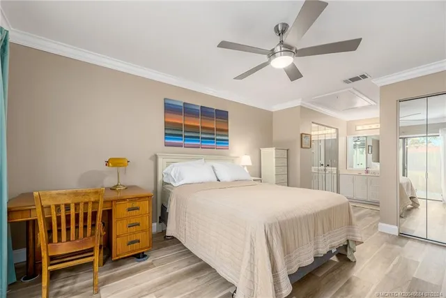 a bathroom with a sink shower and a mirror
