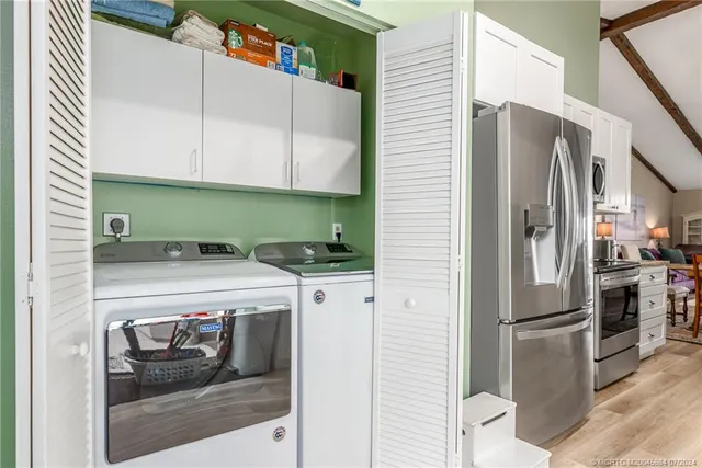 a view of a back yard from a balcony