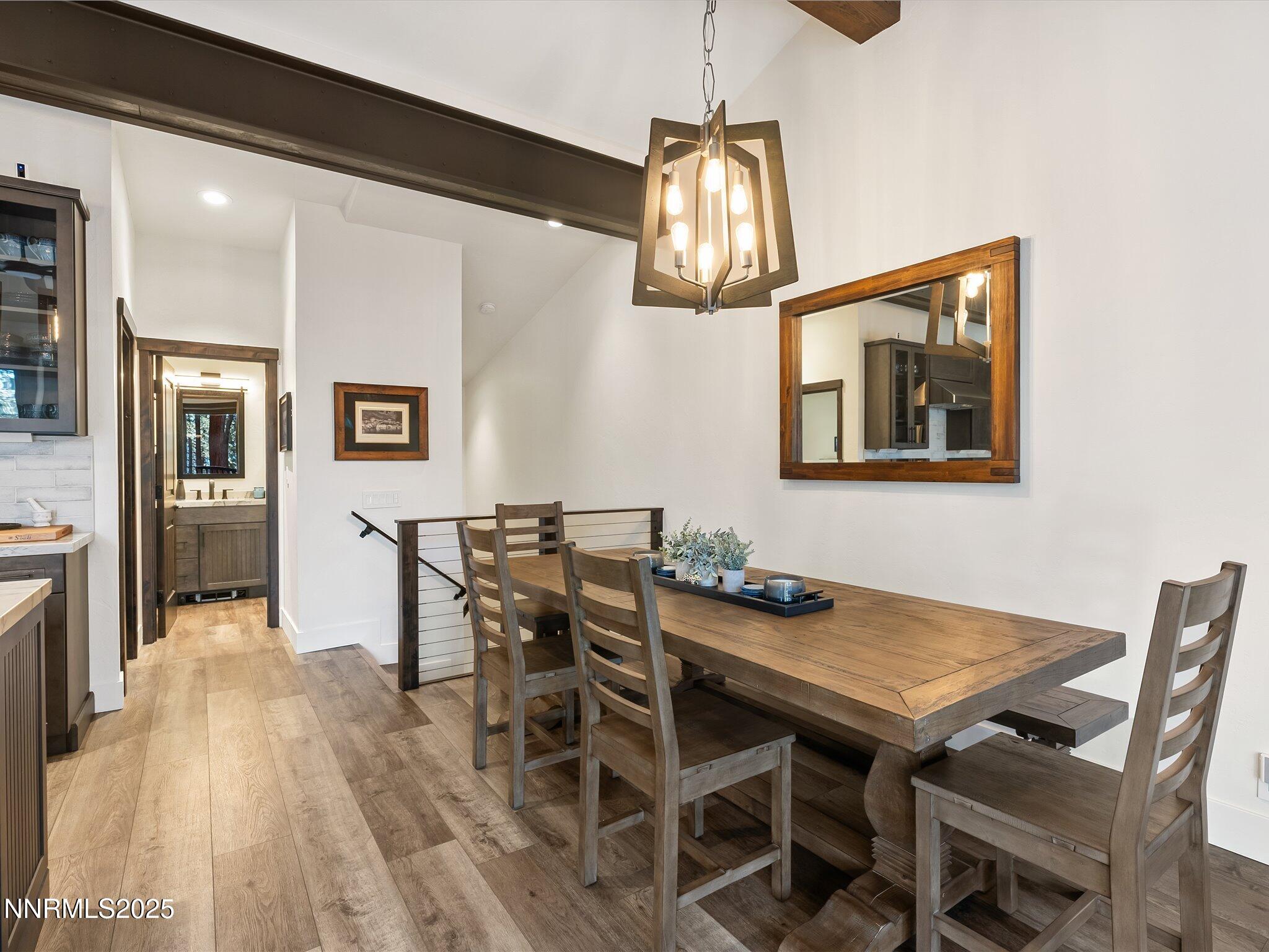 600 Highway 50, Unit 60 Zephyr Cove, NV 89448 - Photo 11 of 59 a view of a dining room with furniture and wooden floor
