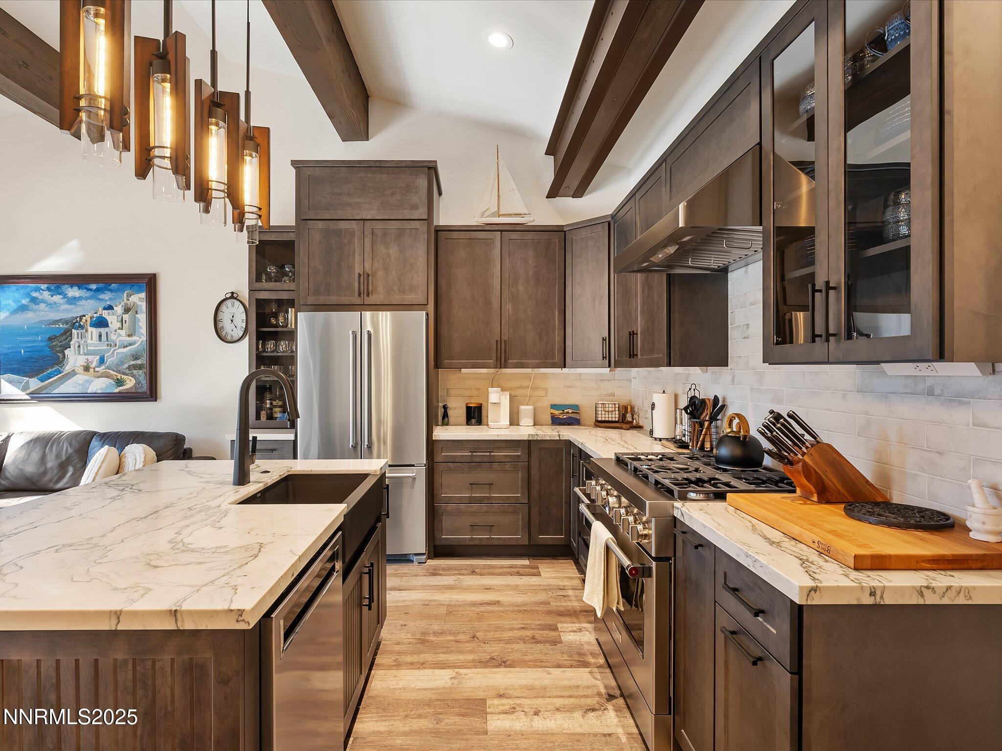 600 Highway 50, Unit 60 Zephyr Cove, NV 89448 - Photo 14 of 59 a kitchen with a stove and a refrigerator