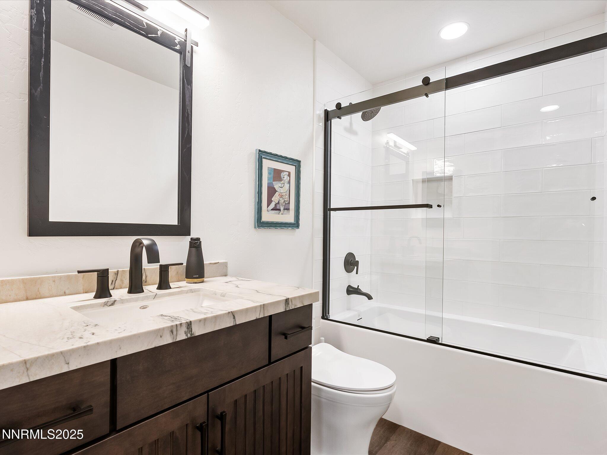600 Highway 50, Unit 60 Zephyr Cove, NV 89448 - Photo 21 of 59 a bathroom with a sink a toilet and shower