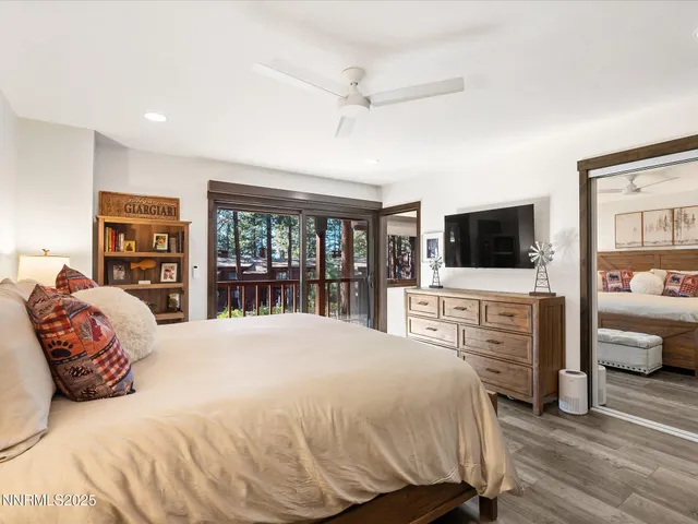 a view of a lake with houses in the back