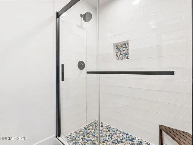 a swimming pool with trees in front of it