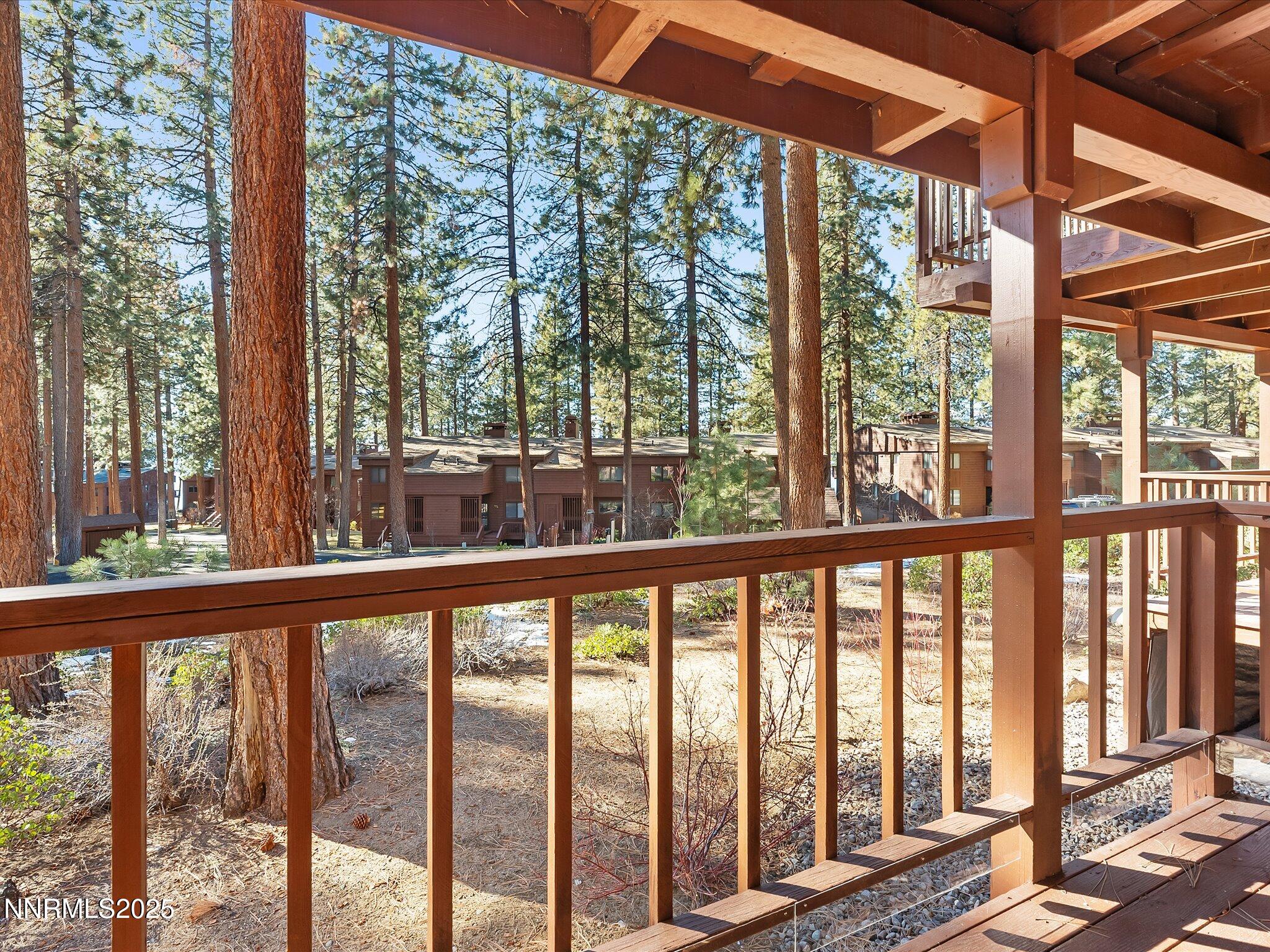 600 Highway 50, Unit 60 Zephyr Cove, NV 89448 - Photo 31 of 59 a view of a wooden deck next to a yard