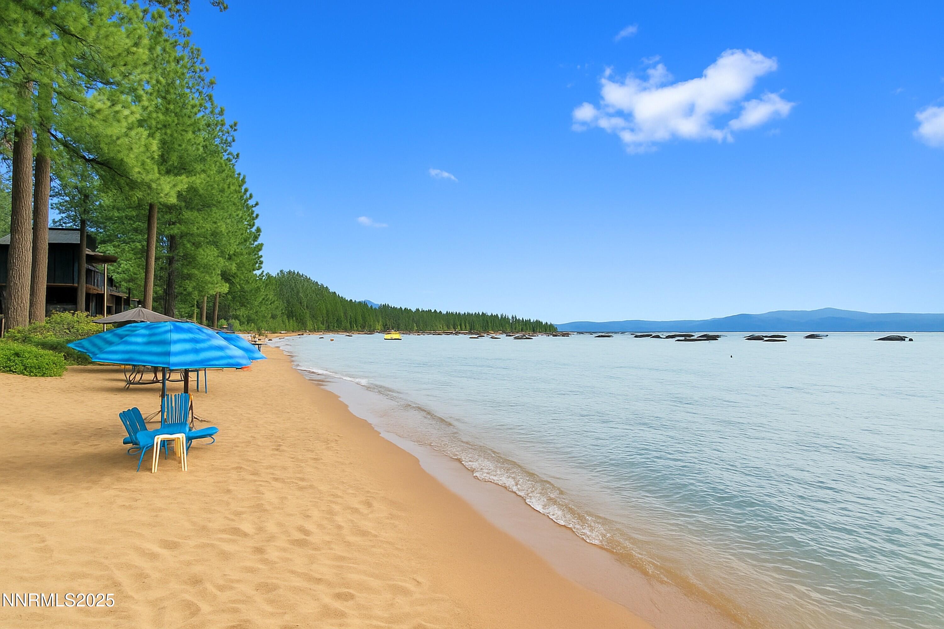 600 Highway 50, Unit 60 Zephyr Cove, NV 89448 - Photo 40 of 59 a view of a lake with a table and chairs