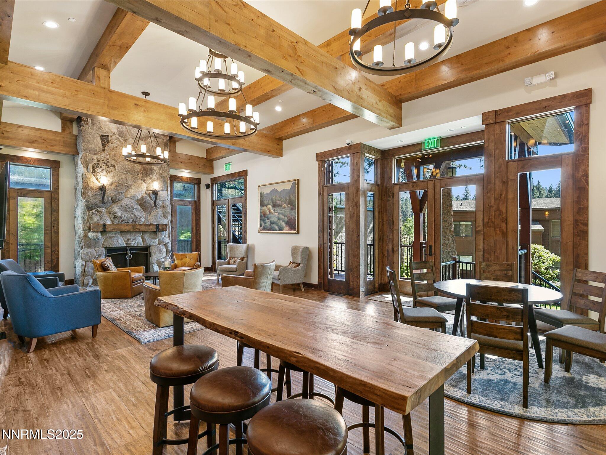 600 Highway 50, Unit 60 Zephyr Cove, NV 89448 - Photo 49 of 59 a dining room with furniture a chandelier and wooden floor