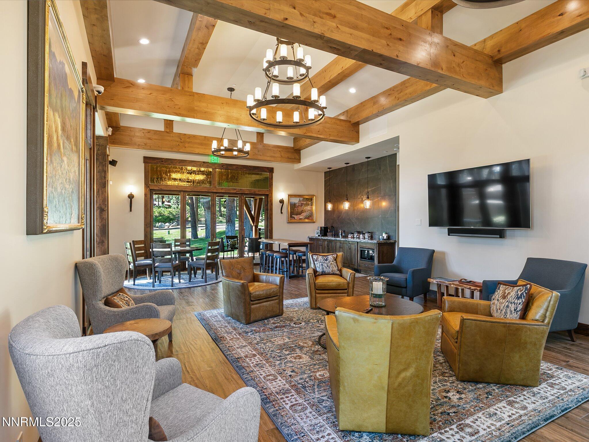 600 Highway 50, Unit 60 Zephyr Cove, NV 89448 - Photo 53 of 59 a living room with fireplace furniture and a flat screen tv