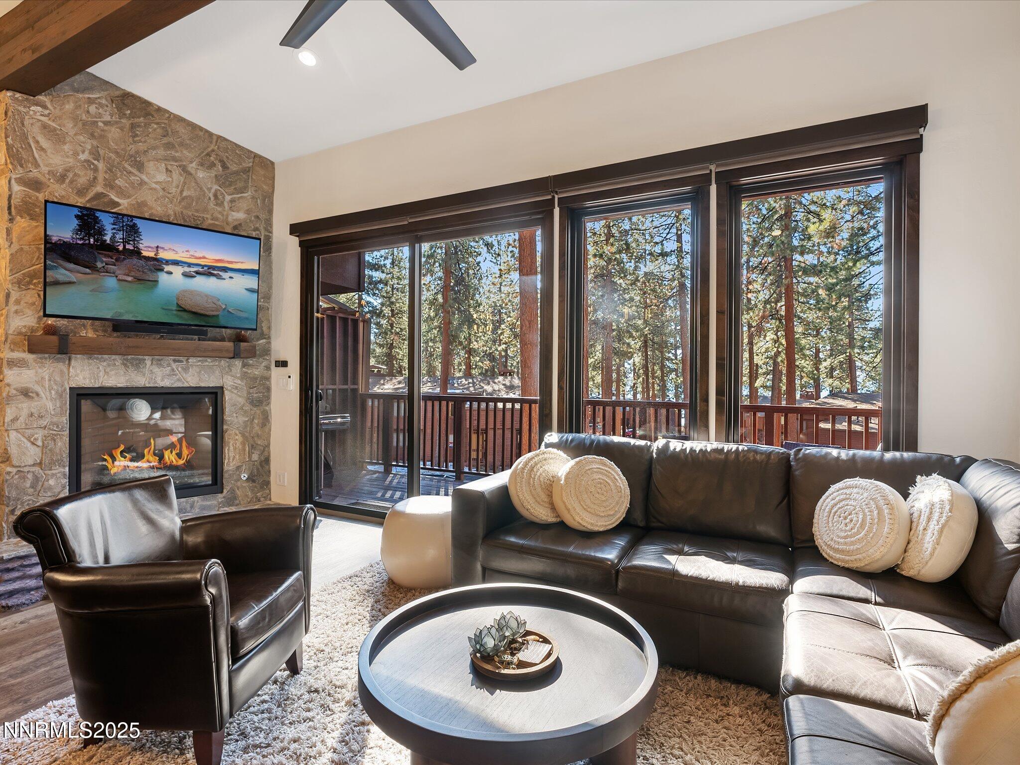 600 Highway 50, Unit 60 Zephyr Cove, NV 89448 - Photo 6 of 59 a living room with furniture and a floor to ceiling window