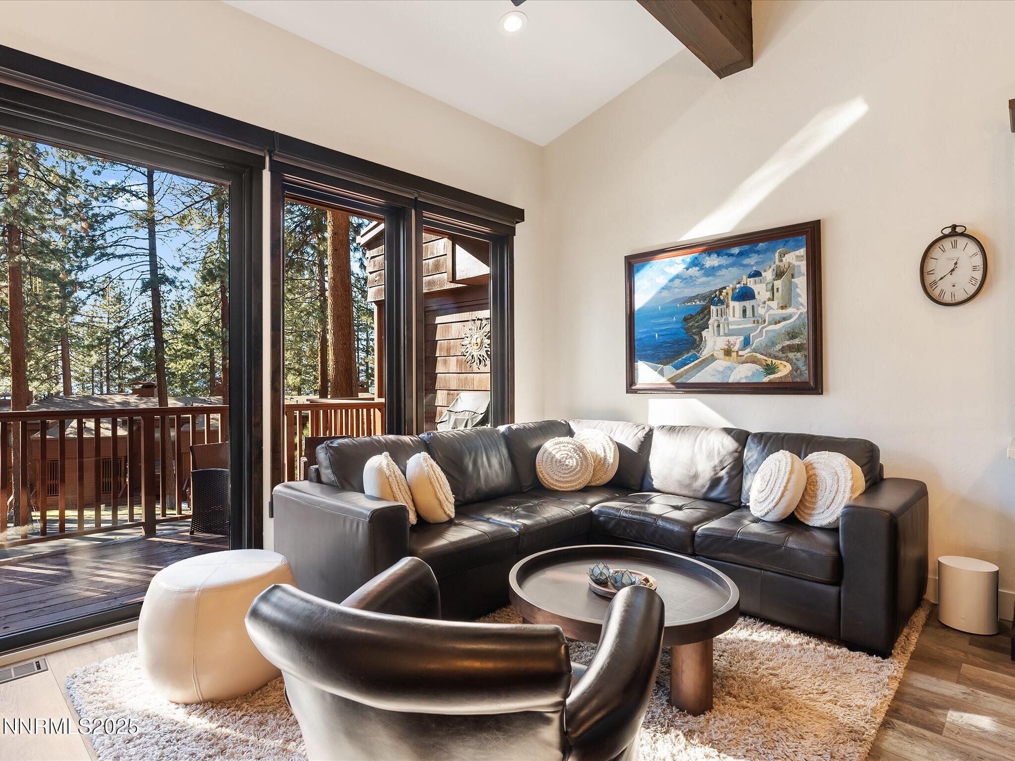 600 Highway 50, Unit 60 Zephyr Cove, NV 89448 - Photo 8 of 59 a living room with furniture and a large window