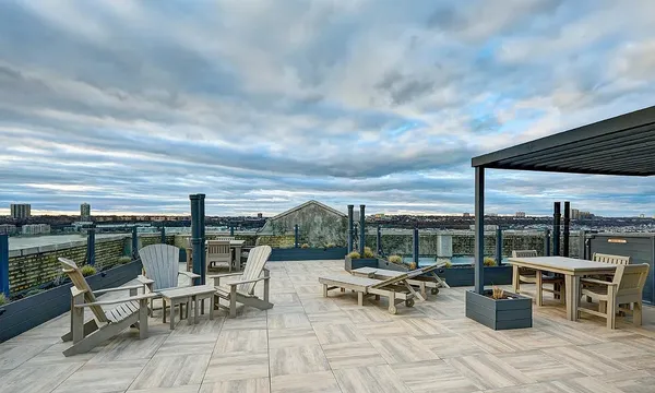 a view of outdoor space with seating area and barbeque oven