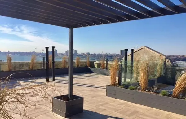 a roof deck with couch