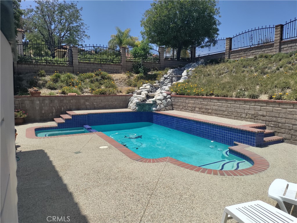 25225 Sagecrest Circle Stevenson Ranch, CA 91381 - Photo 8 of 50 Pool, spa, water fall