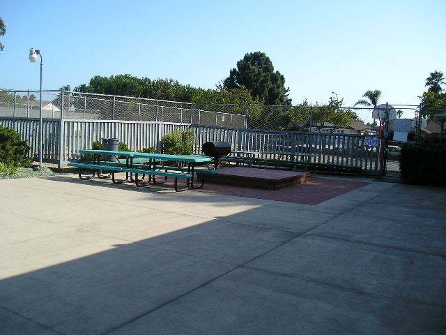 7337 Hillsboro Street Goleta, CA 93117 - Photo 17 of 18 a view of a tennis court