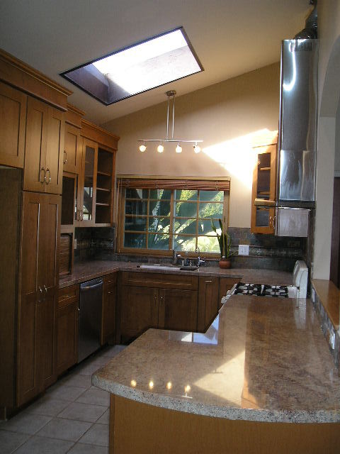 7337 Hillsboro Street Goleta, CA 93117 - Photo 2 of 18 a kitchen with stainless steel appliances granite countertop a sink and a stove