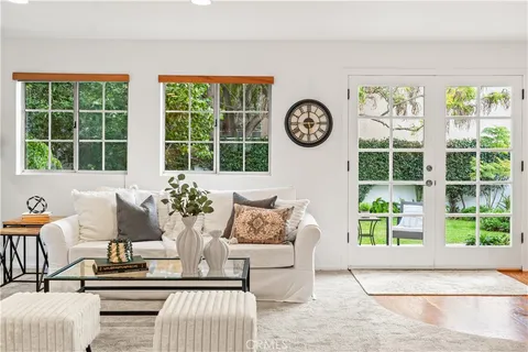 a living room with furniture and window