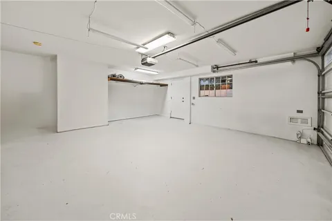 a view of a kitchen with wooden floor